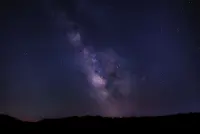 Background Image showing the night sky in blue and purple with hundrets of stars
